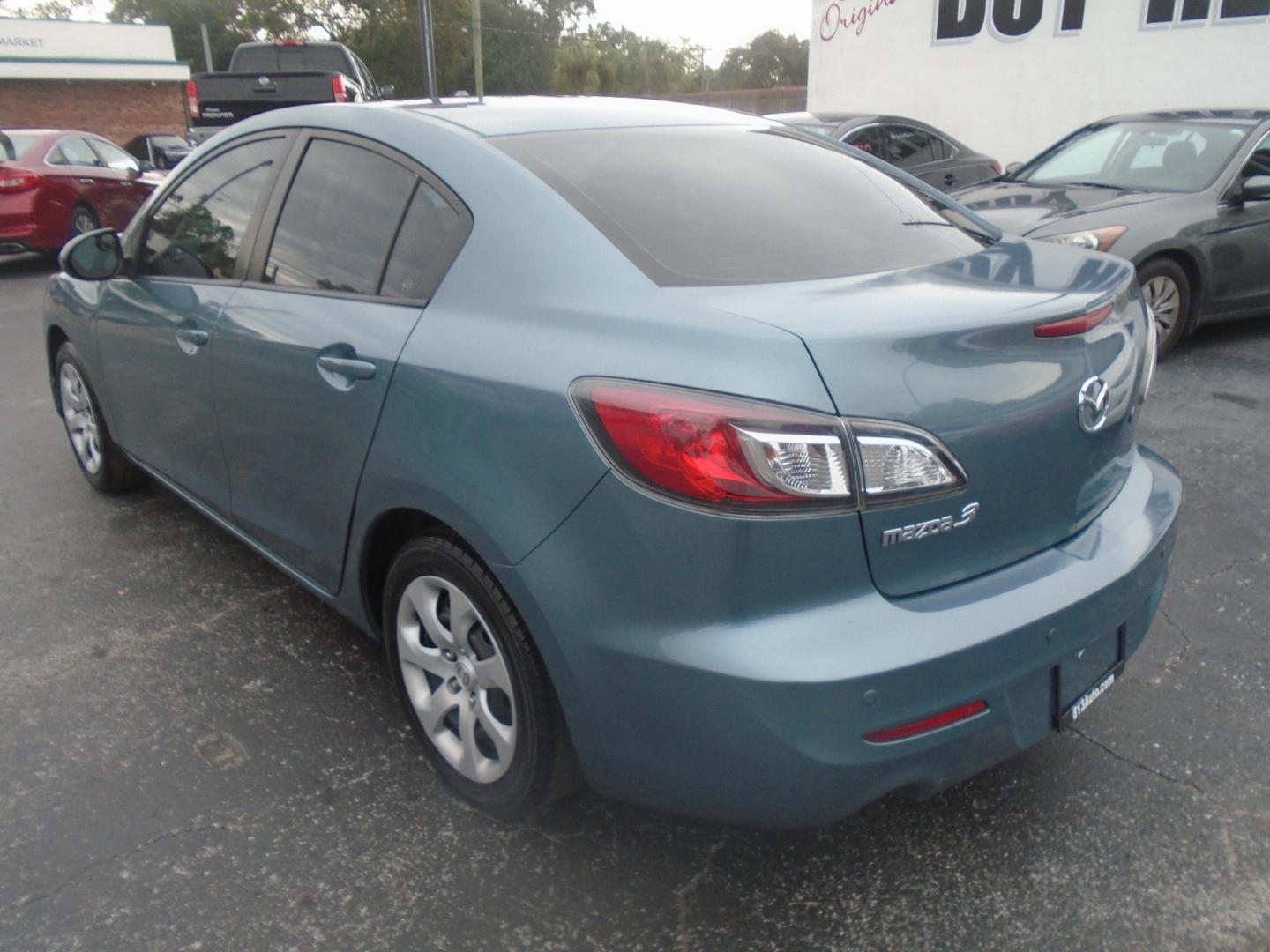 2012 Mazda MAZDA3 (JM1BL1UF0C1) , located at 6112 N Florida Avenue, Tampa, FL, 33604, (888) 521-5131, 27.954929, -82.459534 - Photo#4